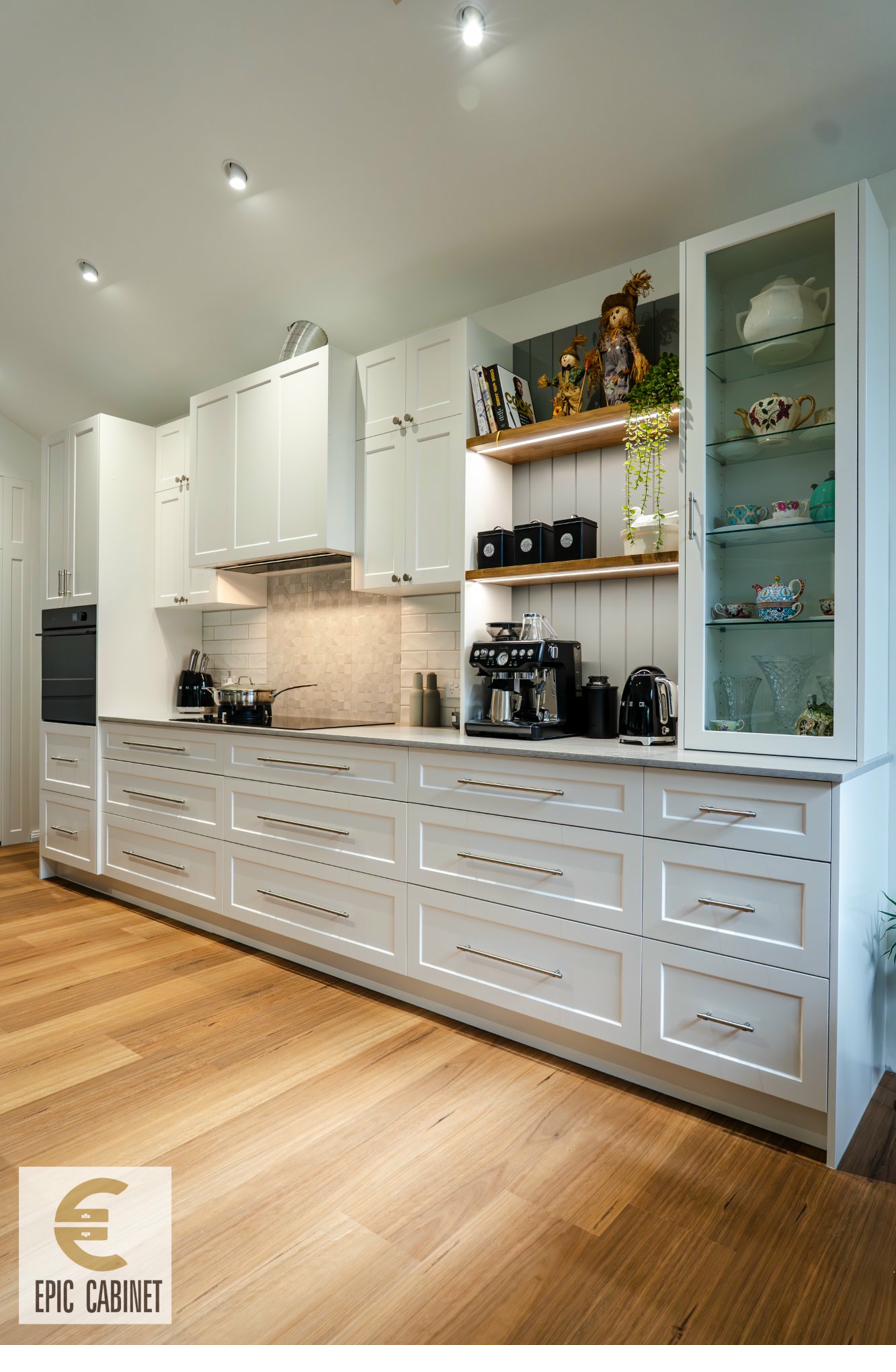 Custom joinery Melbourne - bespoke kitchen with open shelving and glass cabinetry