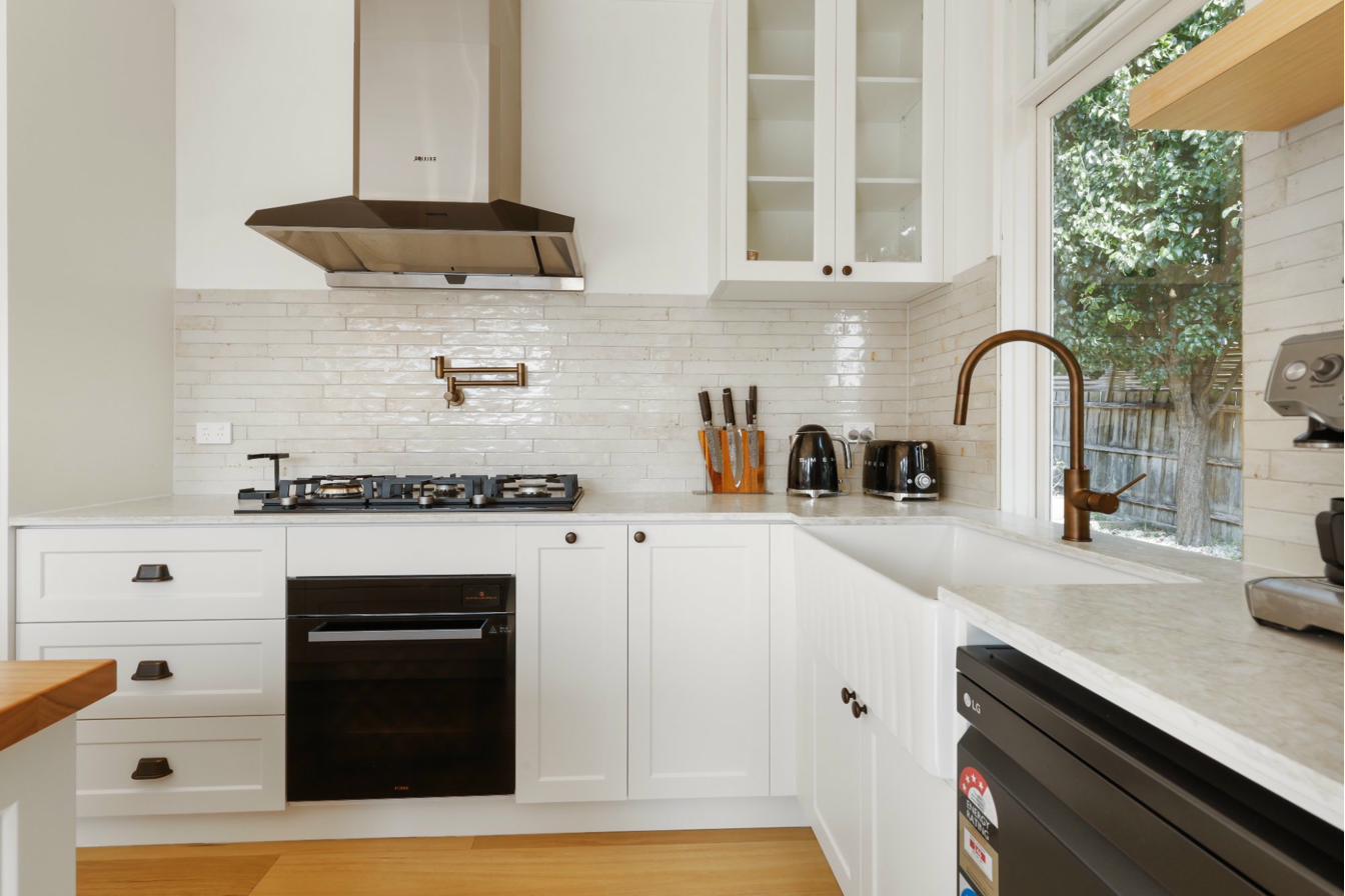 Custom laundry cabinetry Melbourne with stone benchtop